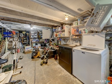 Charming 2-bedroom ranch-style home on a lovely lake offers a - photo 25