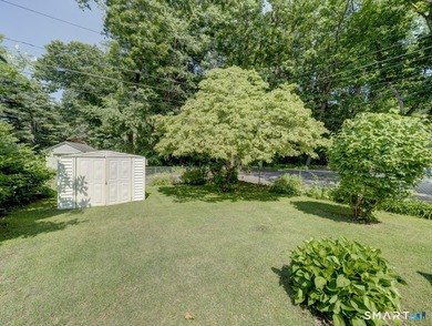 Charming 2-bedroom ranch-style home on a lovely lake offers a - photo 28