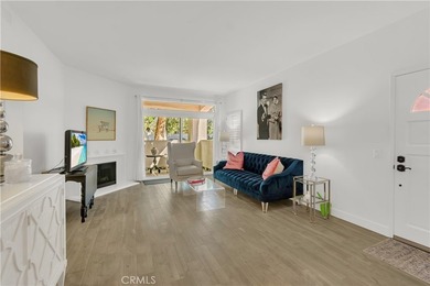 Tucked inside the gated Villa Point community, this lower-level - photo 2