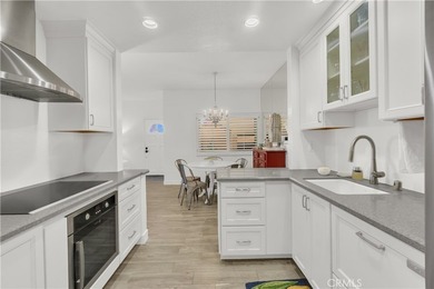 Tucked inside the gated Villa Point community, this lower-level - photo 5