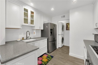 Tucked inside the gated Villa Point community, this lower-level - photo 7