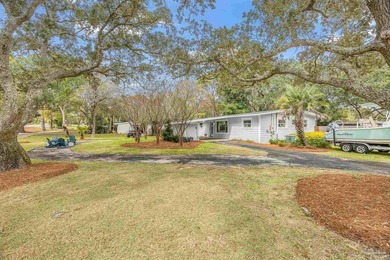 Enjoy coastal living in this well-maintained, fully renovated - photo 4