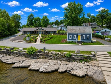 Welcome to this rare, income-producing waterfront retreat in - photo 1
