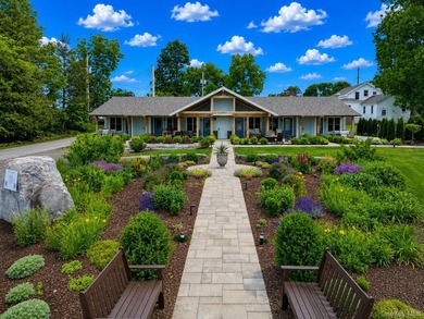 Welcome to this rare, income-producing waterfront retreat in - photo 5