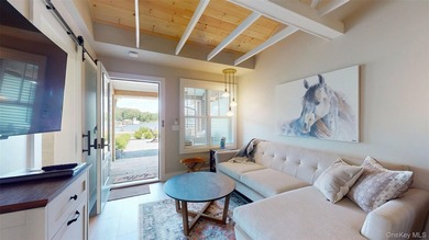 Welcome to this rare, income-producing waterfront retreat in - photo 8