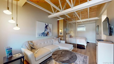 Welcome to this rare, income-producing waterfront retreat in - photo 9
