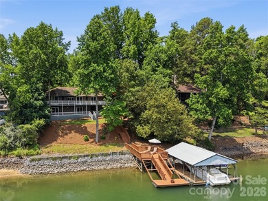 Live the ultimate lakefront lifestyle in this stunning, updated - photo 2
