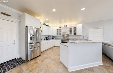 SEASIDE LIVING AT ITS BEST! This gated, impeccably maintained - photo 9