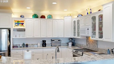 SEASIDE LIVING AT ITS BEST! This gated, impeccably maintained - photo 10