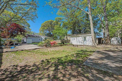 This charming 3-bedroom, 1.5-bath home sits on an oversized - photo 29