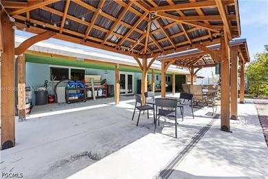This charming ranch-style home in Cape Coral, Florida, offers - photo 31