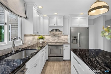 Two distinct homes. One extraordinary address. Both equal in - photo 7