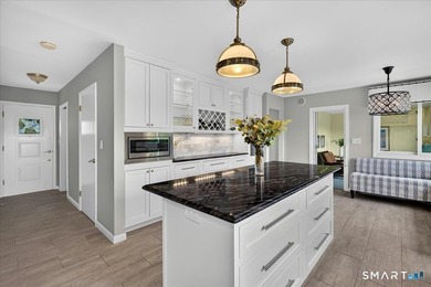 Two distinct homes. One extraordinary address. Both equal in - photo 9
