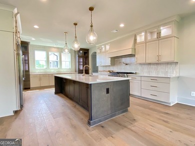 EXPERIENCE THE BEAUTY OF LAKEFRONT LIVING IN THIS SPECTACULAR - photo 15