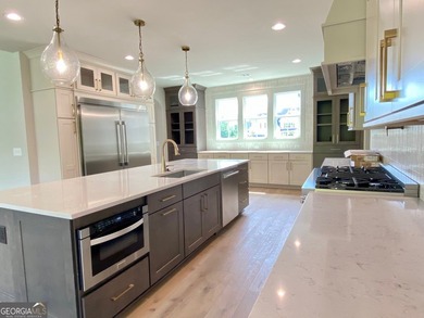 EXPERIENCE THE BEAUTY OF LAKEFRONT LIVING IN THIS SPECTACULAR - photo 16