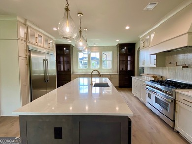 EXPERIENCE THE BEAUTY OF LAKEFRONT LIVING IN THIS SPECTACULAR - photo 17