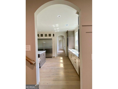 EXPERIENCE THE BEAUTY OF LAKEFRONT LIVING IN THIS SPECTACULAR - photo 21
