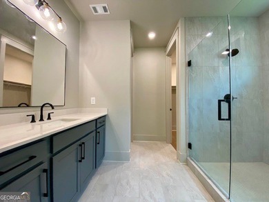 EXPERIENCE THE BEAUTY OF LAKEFRONT LIVING IN THIS SPECTACULAR - photo 34