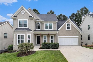 Stunning stucco home in the highly sought-after Summer Grove - photo 1
