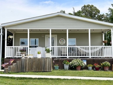 Lake life meets comfort and convenience in this beautifully - photo 3
