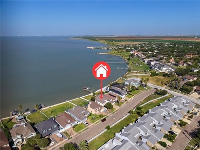 Wake up to breathtaking views of Nueces Bay from this waterfront - photo 2