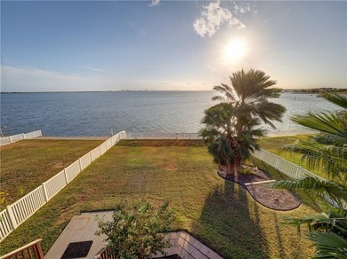 Wake up to breathtaking views of Nueces Bay from this waterfront - photo 5