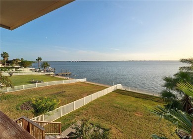 Wake up to breathtaking views of Nueces Bay from this waterfront - photo 6