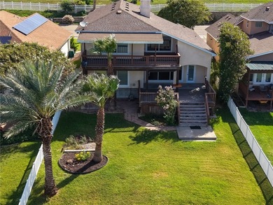 Wake up to breathtaking views of Nueces Bay from this waterfront - photo 9