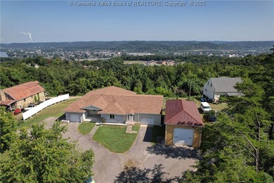 Enjoy breathtaking views from this spacious ranch home offering
