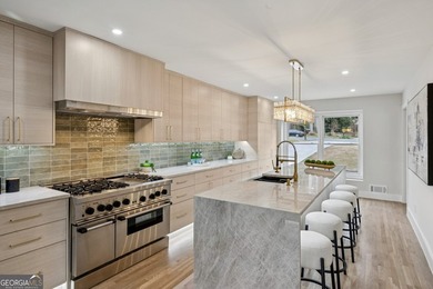 Stylish, low-maintenance Brookhaven living inside gated Ashford - photo 13