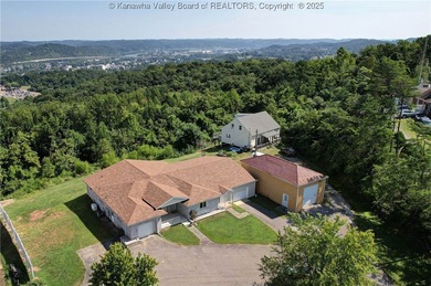 Enjoy breathtaking views from this spacious ranch home offering