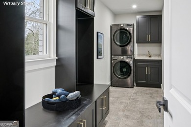 Stylish, low-maintenance Brookhaven living inside gated Ashford - photo 15