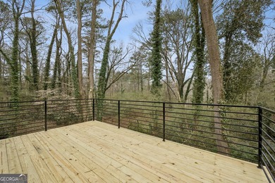 Stylish, low-maintenance Brookhaven living inside gated Ashford - photo 18