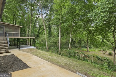 Stylish, low-maintenance Brookhaven living inside gated Ashford - photo 19