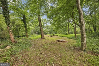 Stylish, low-maintenance Brookhaven living inside gated Ashford - photo 20