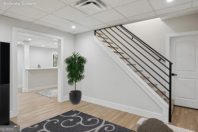 Stylish, low-maintenance Brookhaven living inside gated Ashford - photo 25