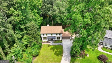 Stylish, low-maintenance Brookhaven living inside gated Ashford - photo 37