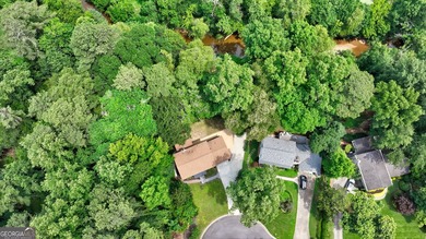 Stylish, low-maintenance Brookhaven living inside gated Ashford - photo 38