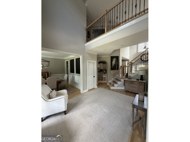 Meticulously maintained 5/4.5 bath Craftsman style home located - photo 3