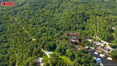 700+ Feet of Lakefront - 3.3 +/- Acres - Cove Protection - - photo 56