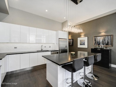 A private elevator entry opens directly into a beautifully