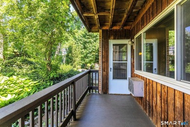 Beautifully updated ground-level ranch style end-unit in - photo 13
