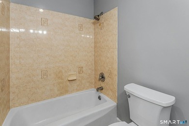 Beautifully updated ground-level ranch style end-unit in - photo 22