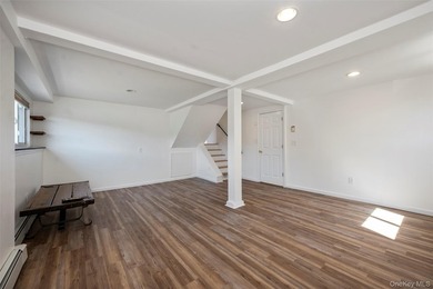Welcome to this beautifully updated expanded split nestled in - photo 11