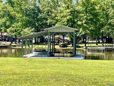 Nestled on the scenic shores of Weiss Lake in the sought-after - photo 3