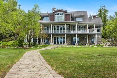 Experience unparalleled shorefront luxury in this magnificent - photo 1