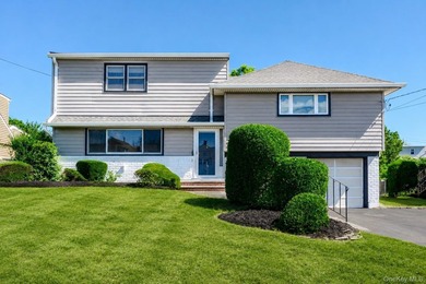 Welcome to this beautifully updated expanded split nestled in - photo 23