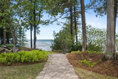 Experience unparalleled shorefront luxury in this magnificent - photo 9