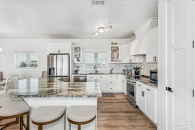 Experience sweeping waterfront views along 97 feet of pristine - photo 9