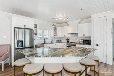 Experience sweeping waterfront views along 97 feet of pristine - photo 10